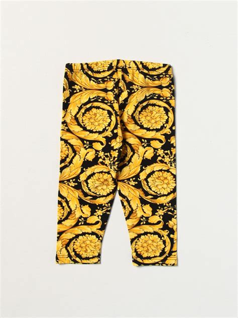 pantaloni versace striscia